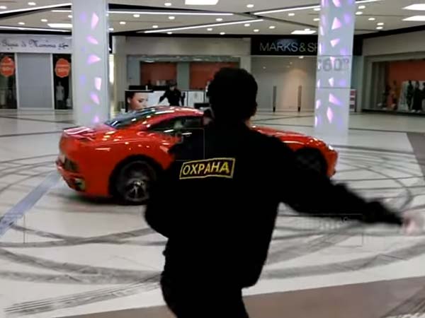Car Drives Through Russian Mall Car Drives Through Russian Mall