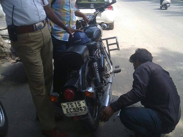 Royal Enfield Exhausts Crushed Under Road Roller By Traffic Police