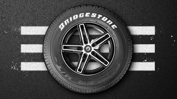 Bridgestone Tyres India Supply PPE Kits To Doctors & Packed Meals & Safety Aids To Migrants & Stranded Truckers