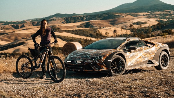 Lamborghini Sterrato Takes On A Dirt Bike In First Teaser For Rally-Prepped Supercar